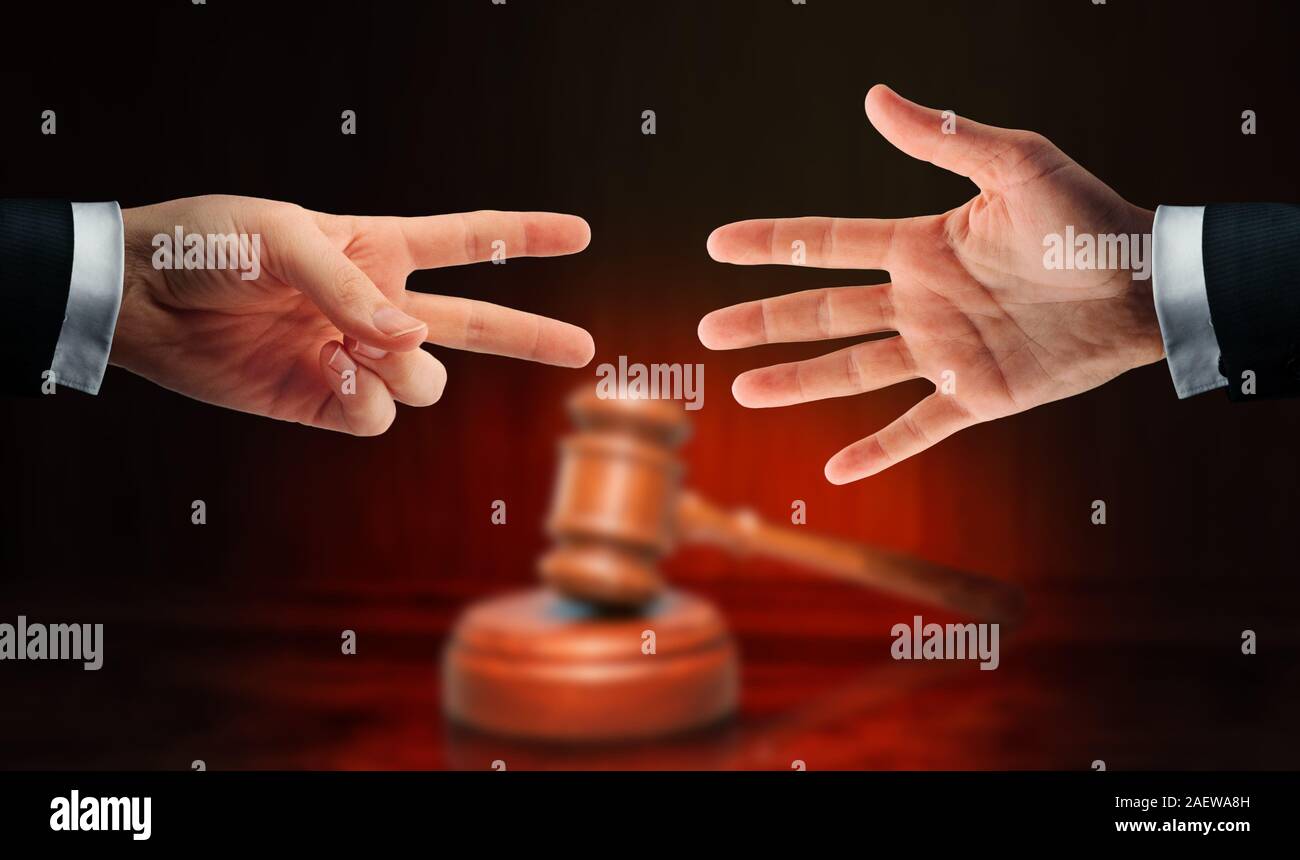 Two lawyers playing rock paper scissors game. Trial court battle theme concept. Stock Photo