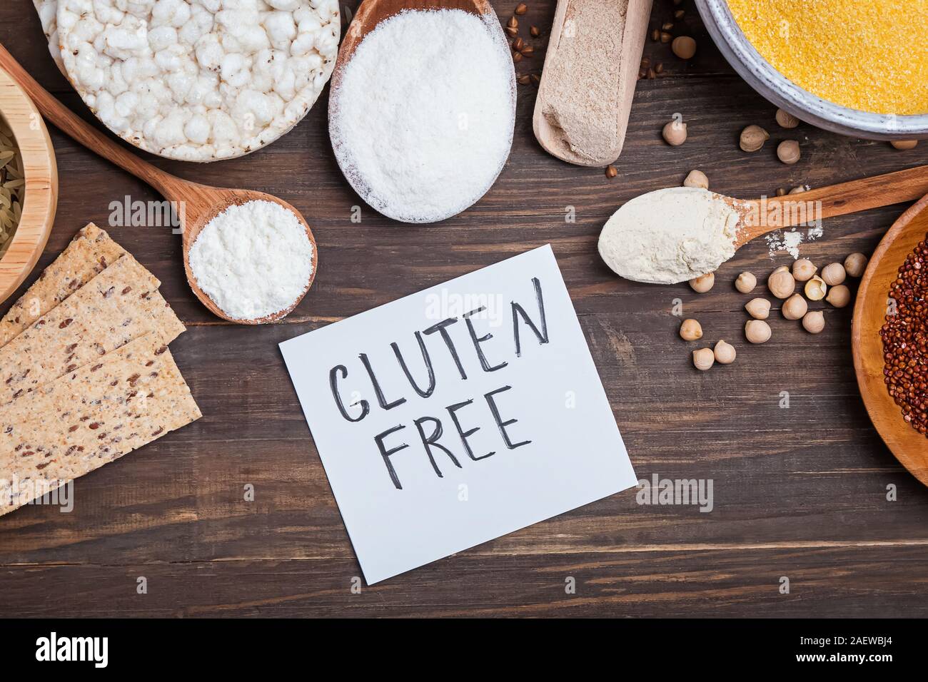 Gluten free grains and alternative flour products. Ingredient for bakery on the wooden table, top view. Stock Photo