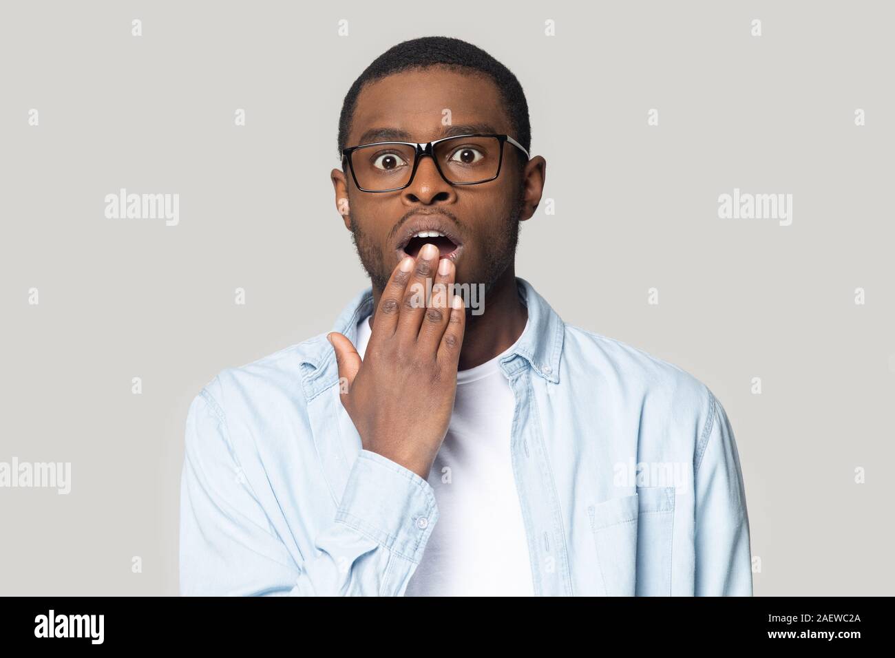 Surprised young african american man looking at camera. Stock Photo