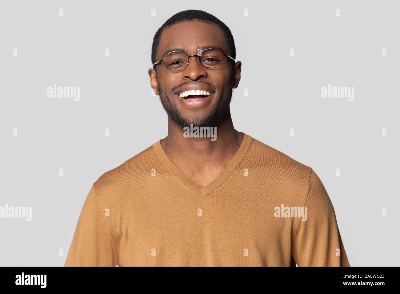 Happy smiling african american man in casual sweater portrait. Stock Photo