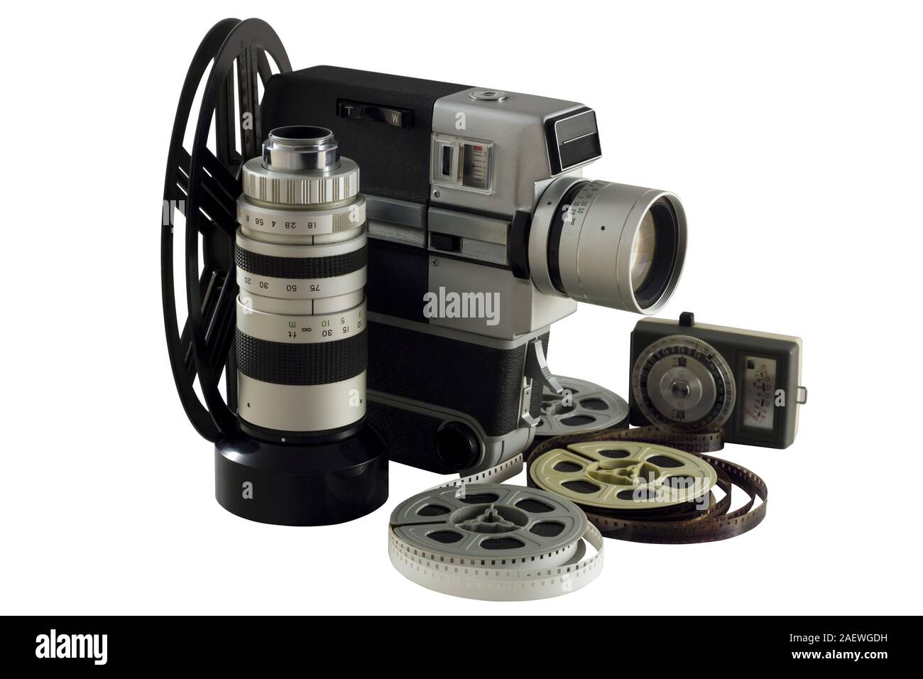 Old camera, lens, light meter and movie reels isolated on white Stock