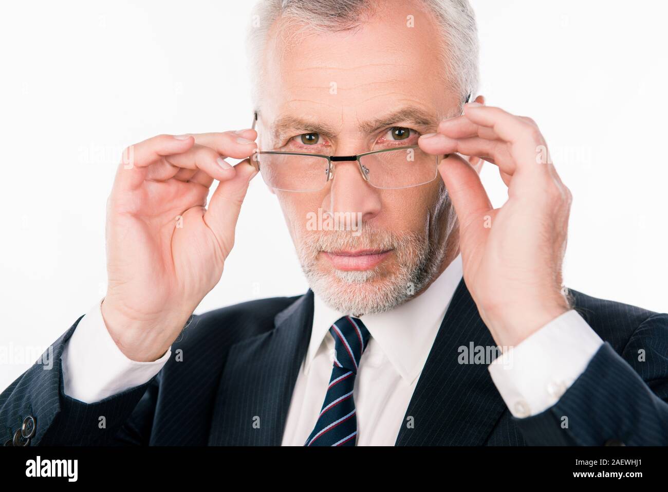 handsome intelligent old man in business suit holding glasses Stock ...