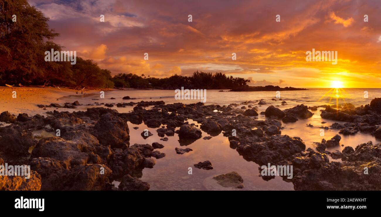 Spectacular sunset at Waialea Beach or Beach 69 on the Kohala Coast of Big Island Hawaii, USA. Stock Photo
