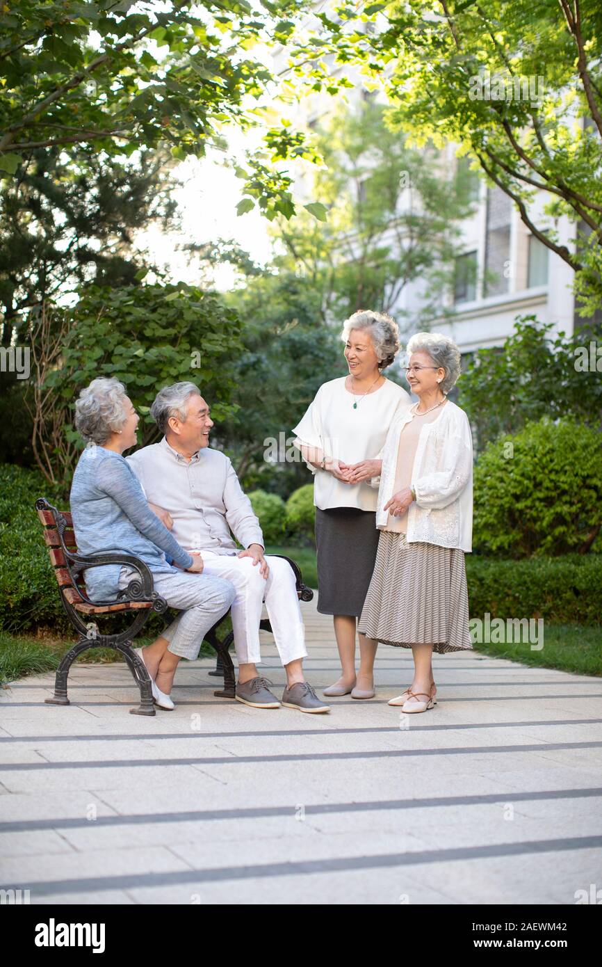 Senior friends talking in nursing home Stock Photo