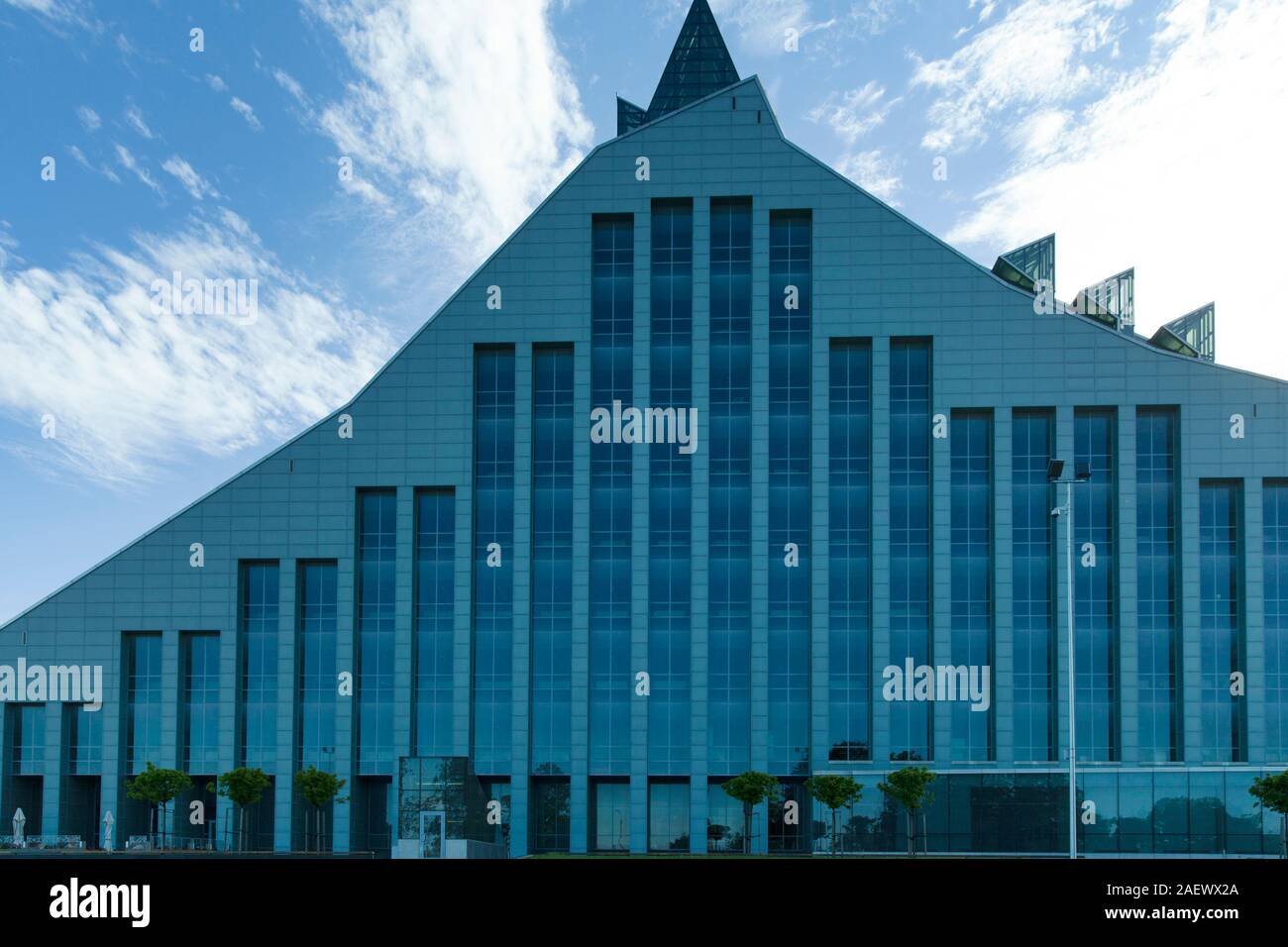 Facade of National library of Latvia with blue sky on the background Stock Photo