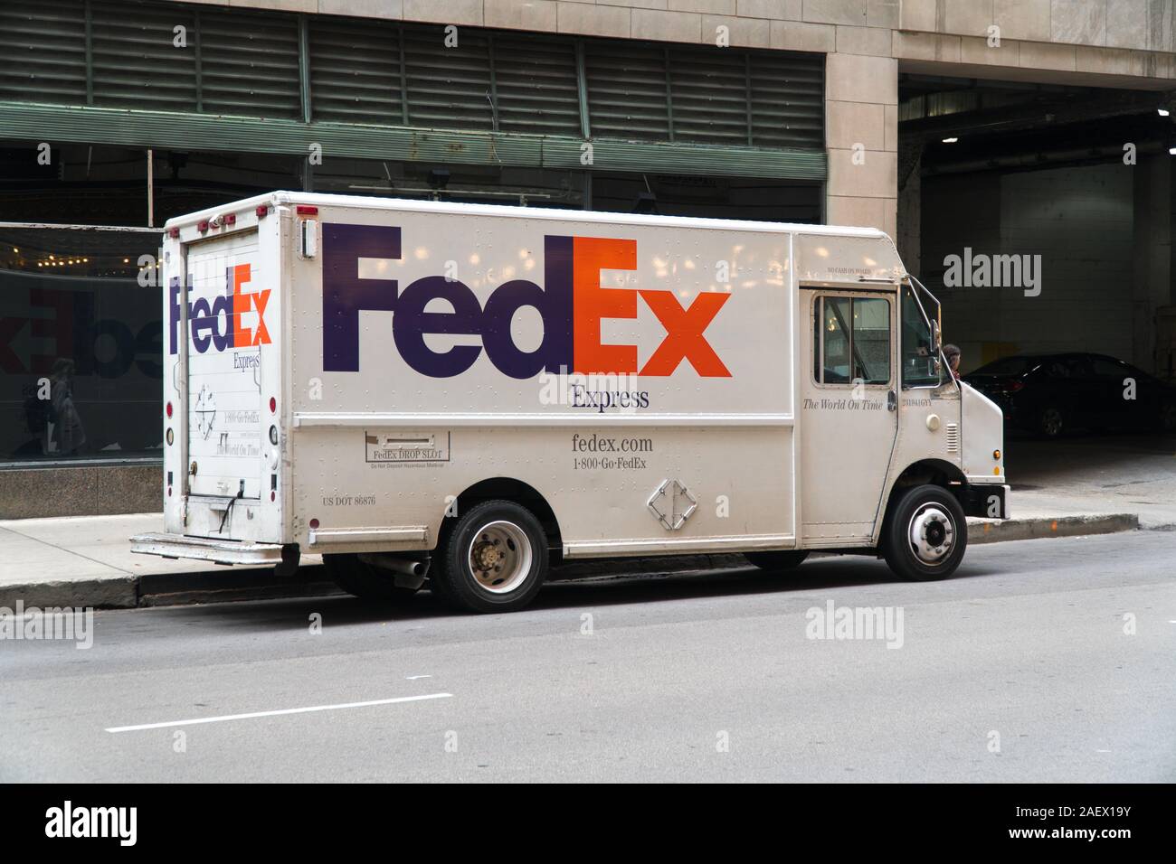 Chicago, USA - Circa 2019: Fedex express truck parked on city roadside making deliveries to office buildings Stock Photo