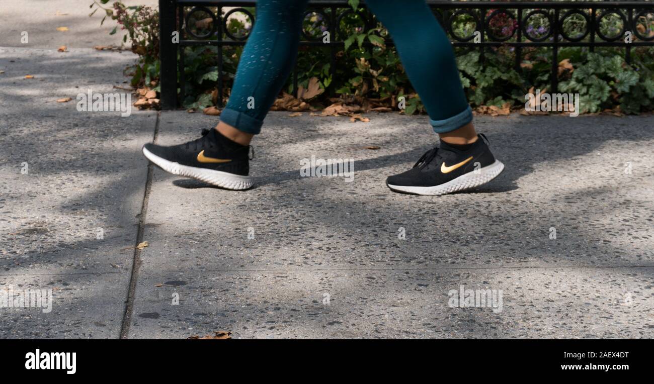 women wearing nike shoes