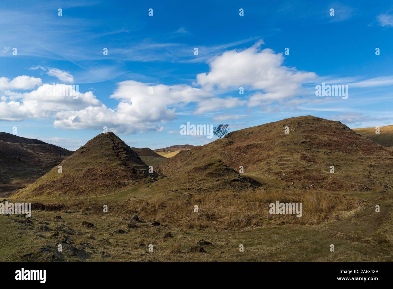 Cone shaped hills at Fairy Glen, near Uig, Isle of Skye, Scotland, UK in March Stock Photo