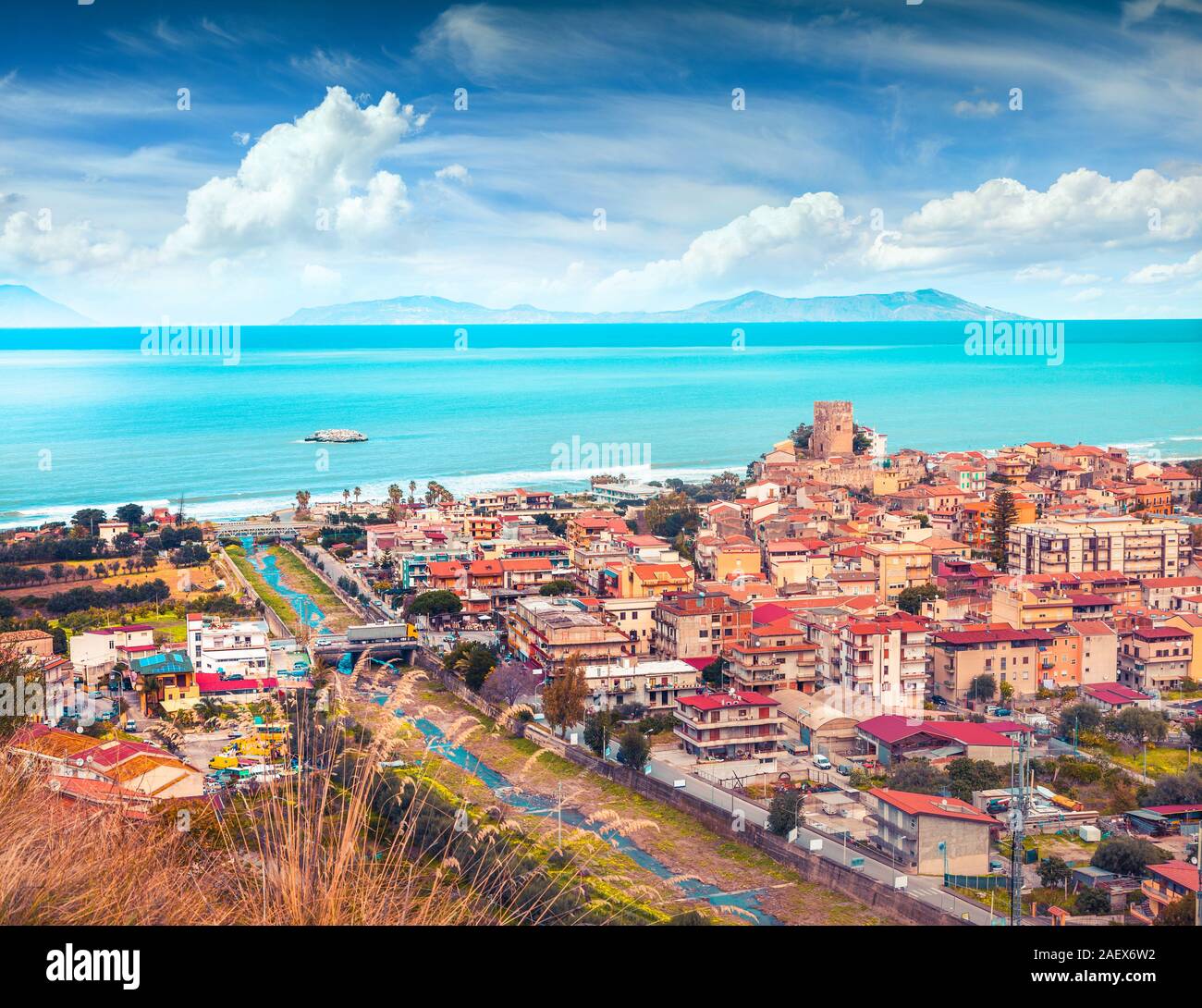 Colorful spring view of Brolo town, Messina. Mediterranean rea, Sicily, Italy, Europe. Instagram toning. Stock Photo