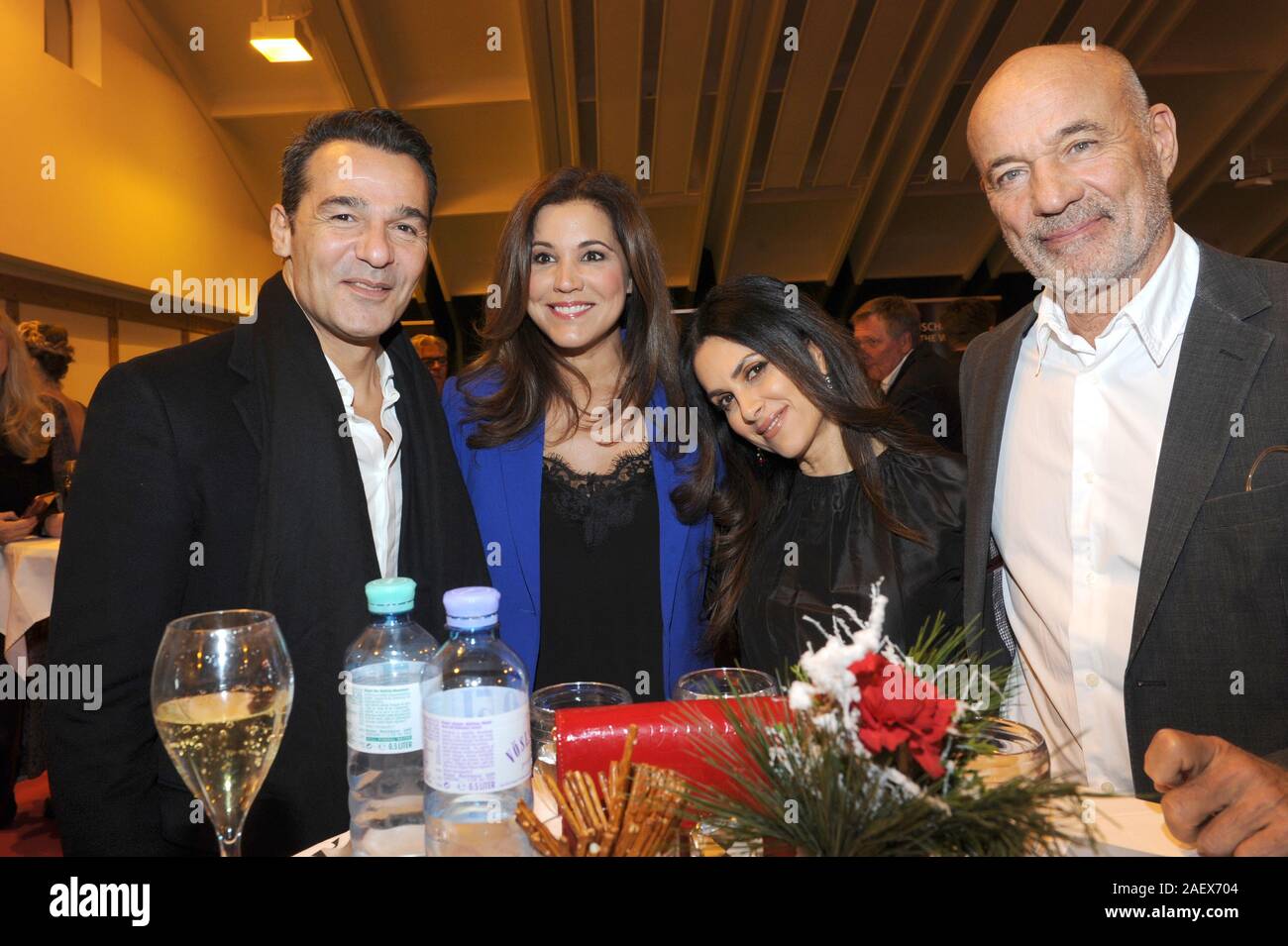 Going, Austria. 10th Dec, 2019. The actor Erol Sander (v-l), the host Karen Webb, Viktoria Lauterbach and the actor Heiner Lauterbach celebrate at the Charity Fight Night in the Wellness Hotel "Stanglwirt" in Going near Kitzbühel. The proceeds will be donated to the "Tribute to Bambi - Kleine Helden e.V. Stiftung". Credit: Ursula Düren/dpa/Alamy Live News Stock Photo