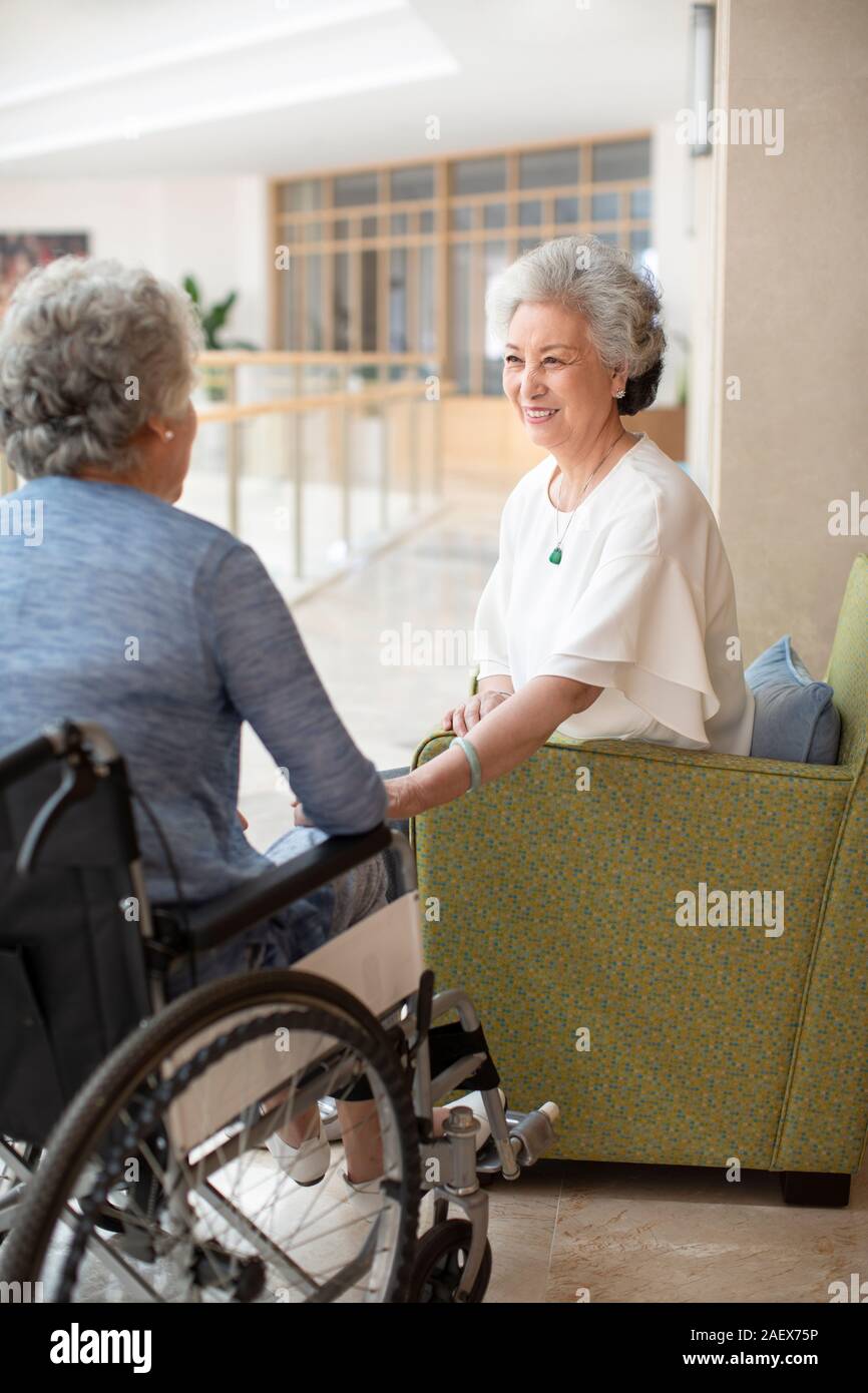 Senior women talking in nursing home Stock Photo