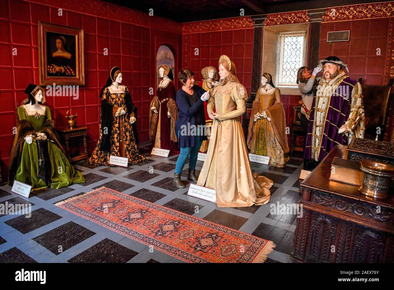 Life size mannequins of the six wives of King Henry VIII are gently brushed and cleaned as part of the cleaning and maintenance of exhibitions at Sudeley Castle in Winchcombe, Gloucestershire. Katherine Parr, the last and surviving wife of King Henry VIII, lived, died and is buried within the grounds of the castle. Stock Photo