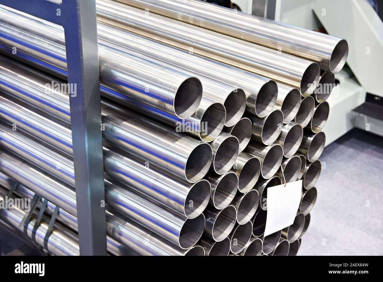Steel pipes in stack closeup Stock Photo - Alamy