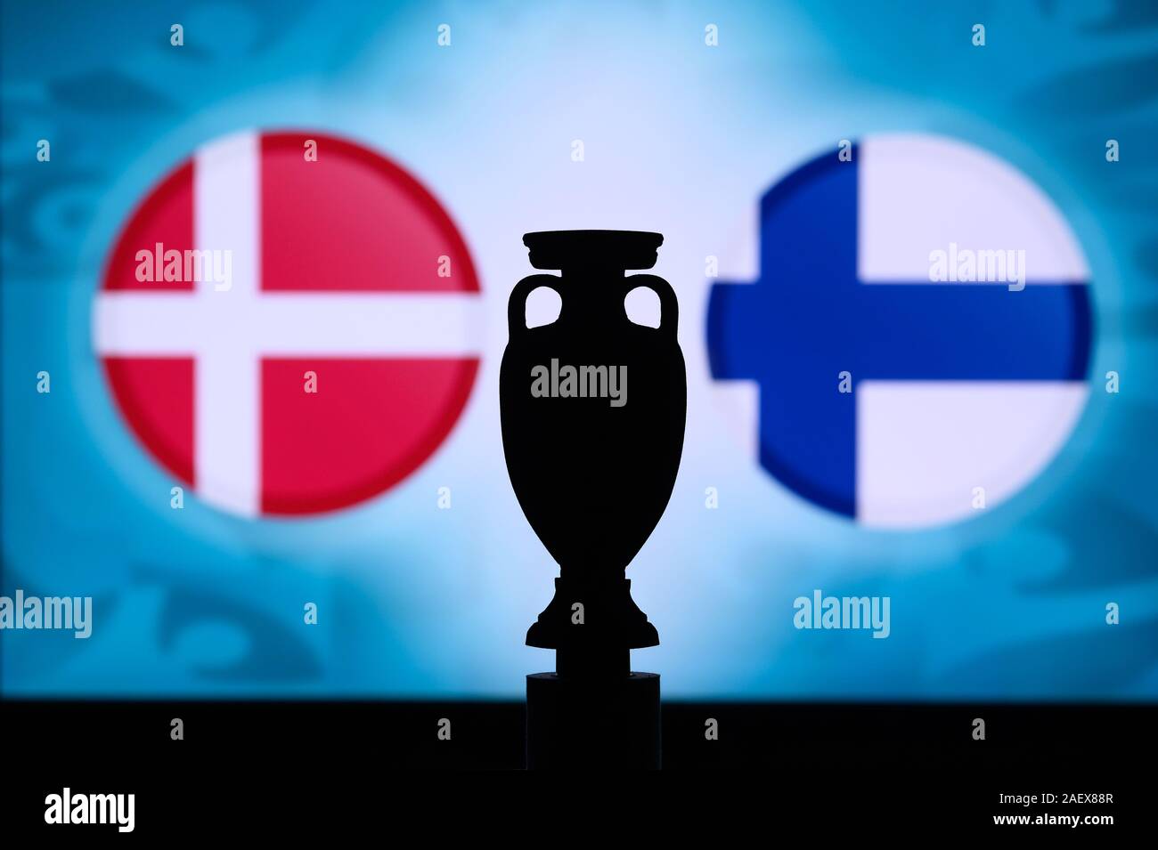 Denmark vs Finland, Euro National flags and football trophy silhouette