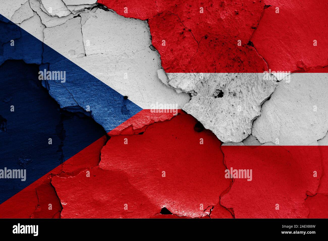 flags of Czech Republic and Austria painted on cracked wall Stock Photo