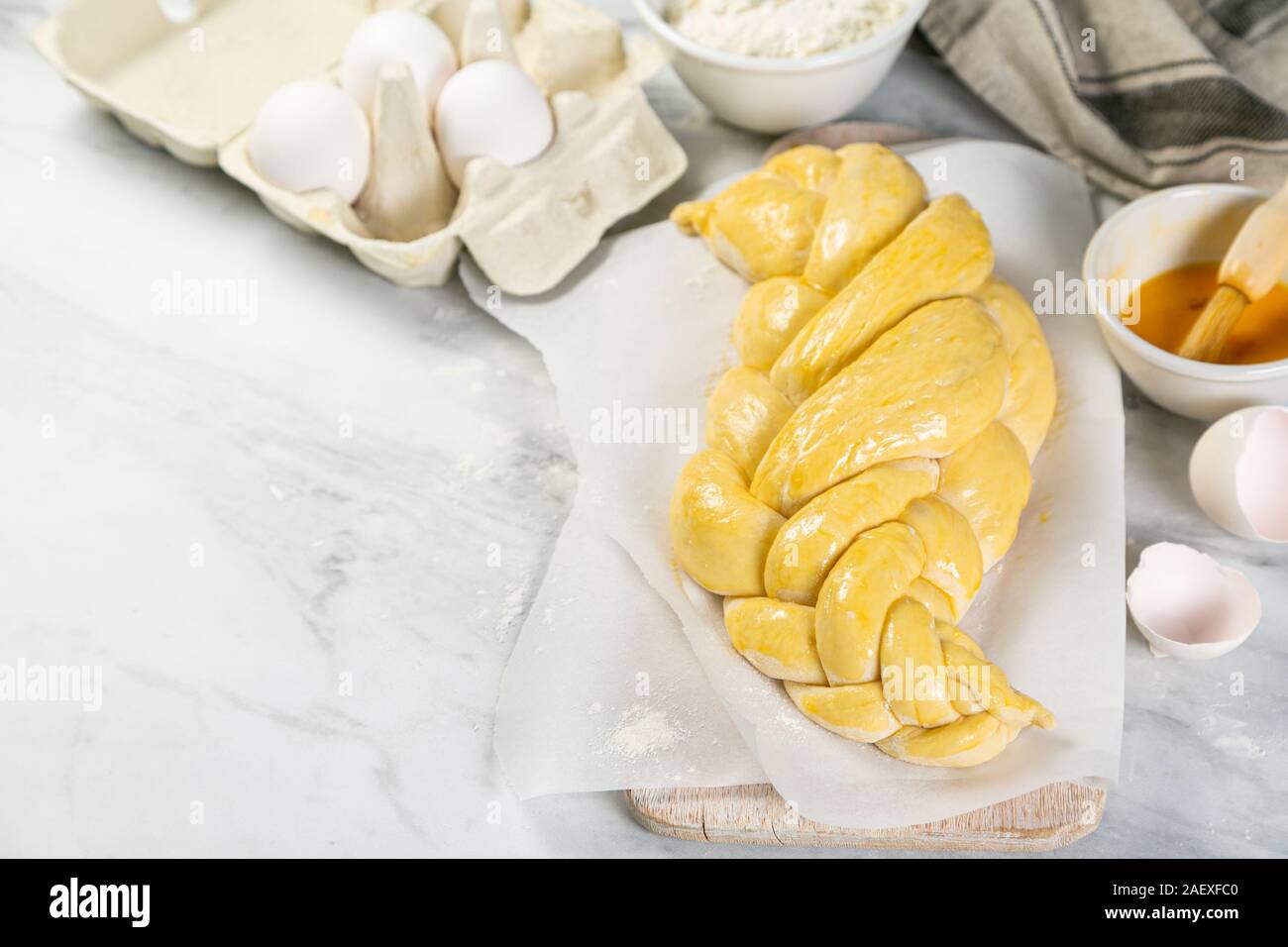 Traditional jewish bread challah on wood background Stock Photo