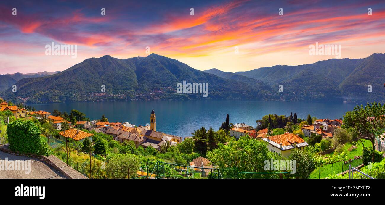 Colorful summer sunrise on the town of Carate Urio, on Lake Como. Alps, Italy, Lombardi, Europe. Stock Photo