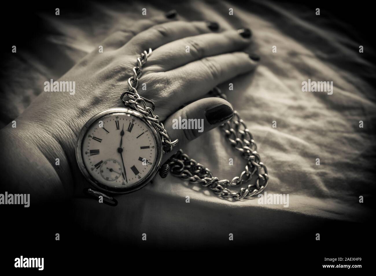 black and white pocket watch