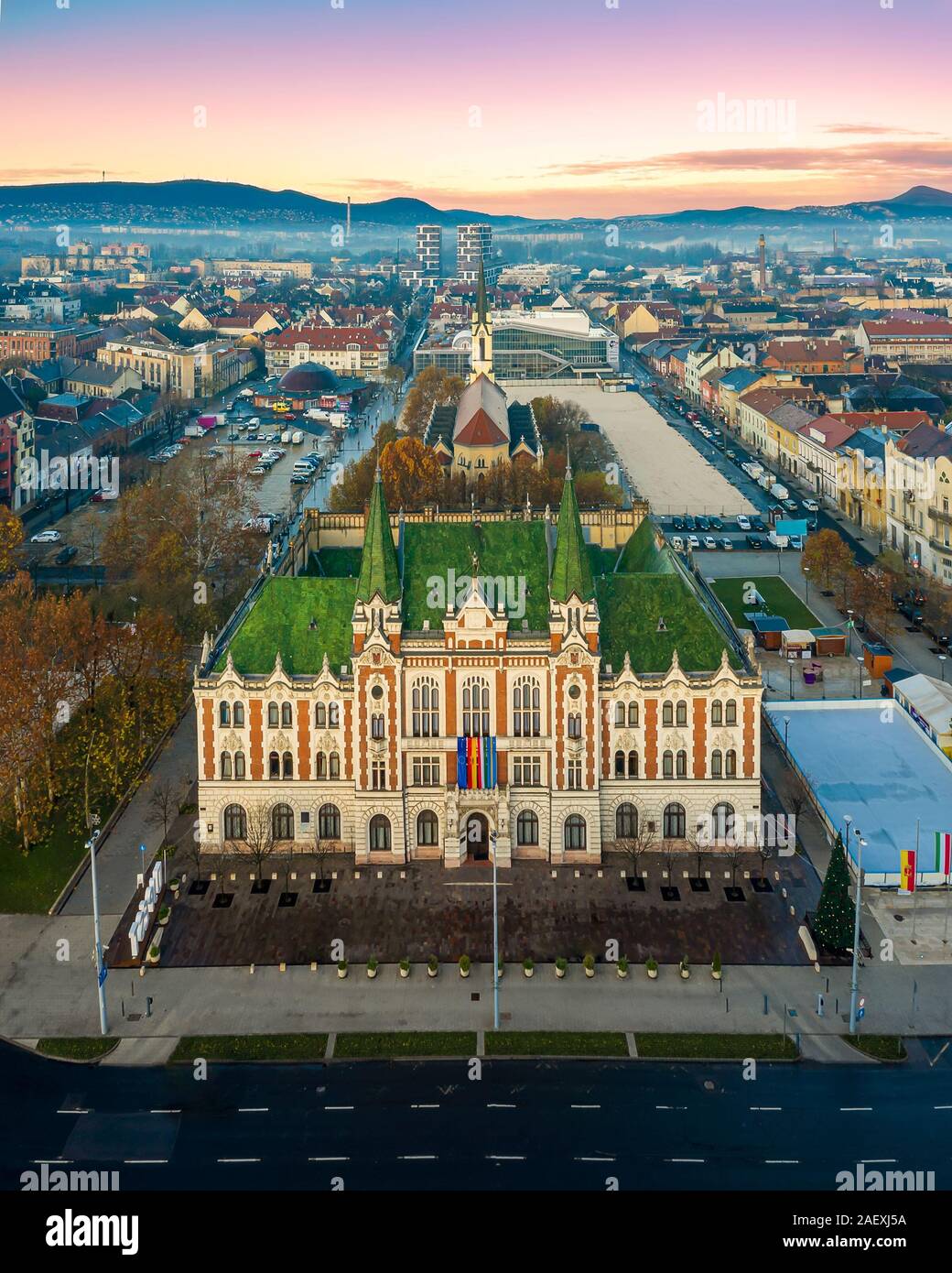 Fantastic high quality photos about center of Ujpest with City hall and  Queen of Heaven church Stock Photo - Alamy