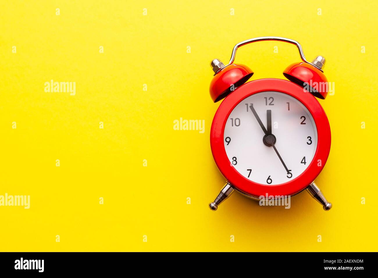 Colorful red traditional alarm clock with bells Stock Photo Alamy