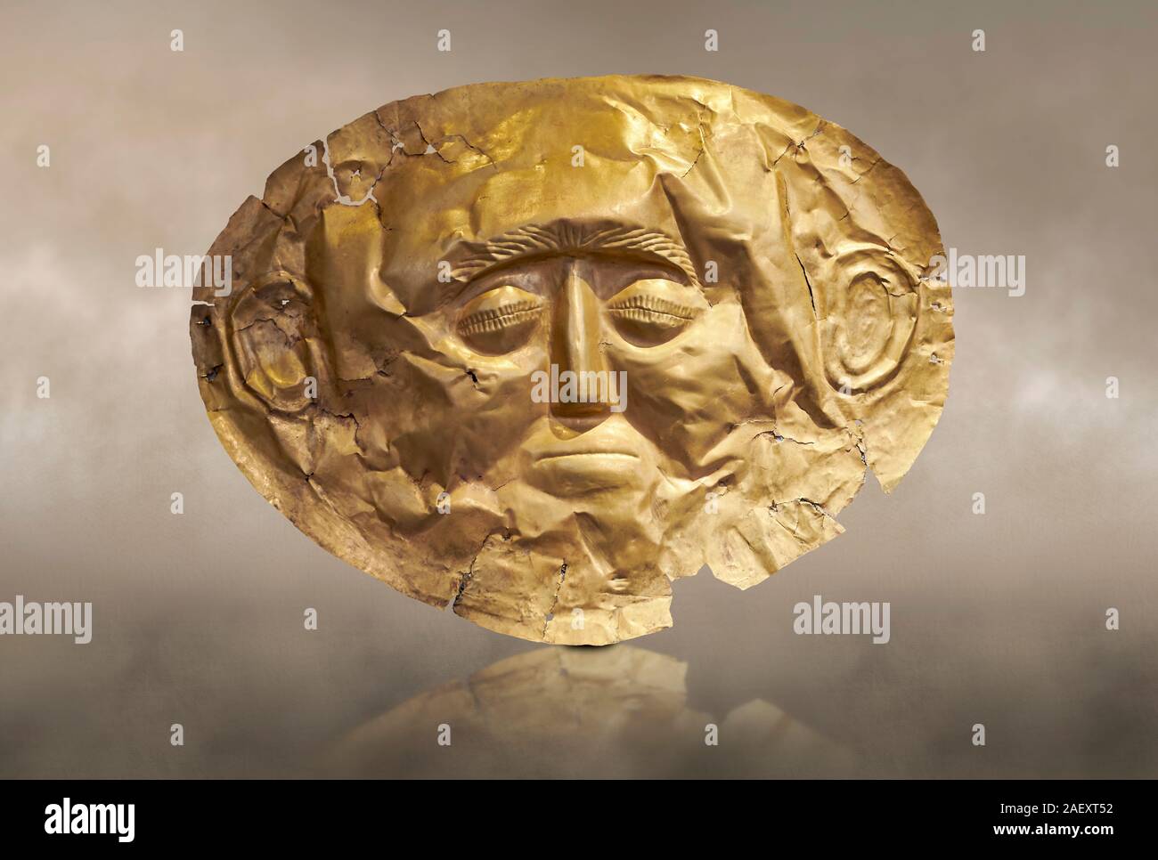 Mycenaean gold death mask, Grave Cicle A, Mycenae, Greece. National Archaeological Museum of Athens.   This death mask is typical of the other Mycenae Stock Photo