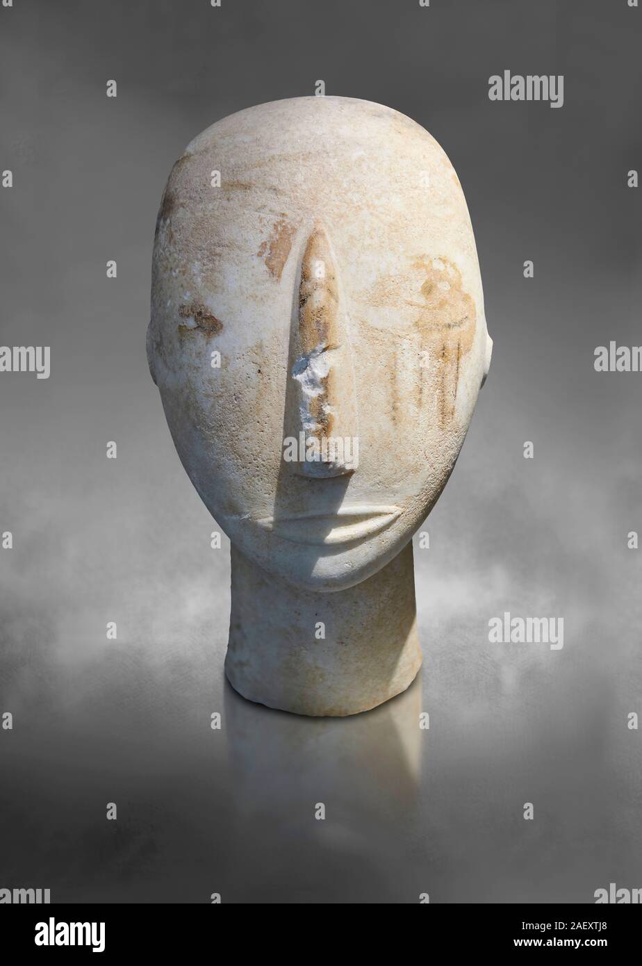 Head of a Cycladic statue with remnants of painted eyes and right cheek