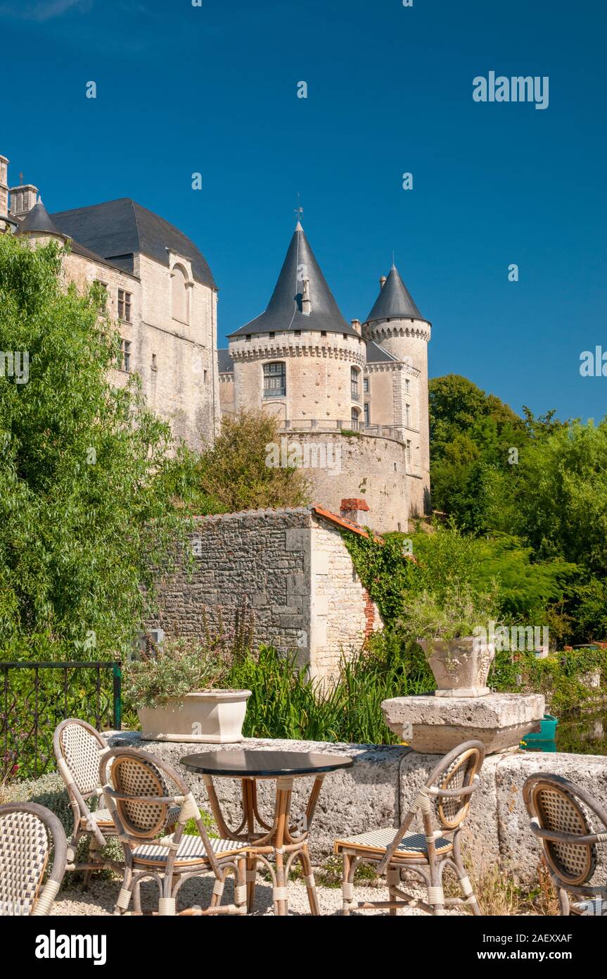 Terrace with chairs and tables and view of Verteuil-sur-Charente castle, a listed historic heritage monument, Charente (16), Nouvelle-Aquitaine, Franc Stock Photo