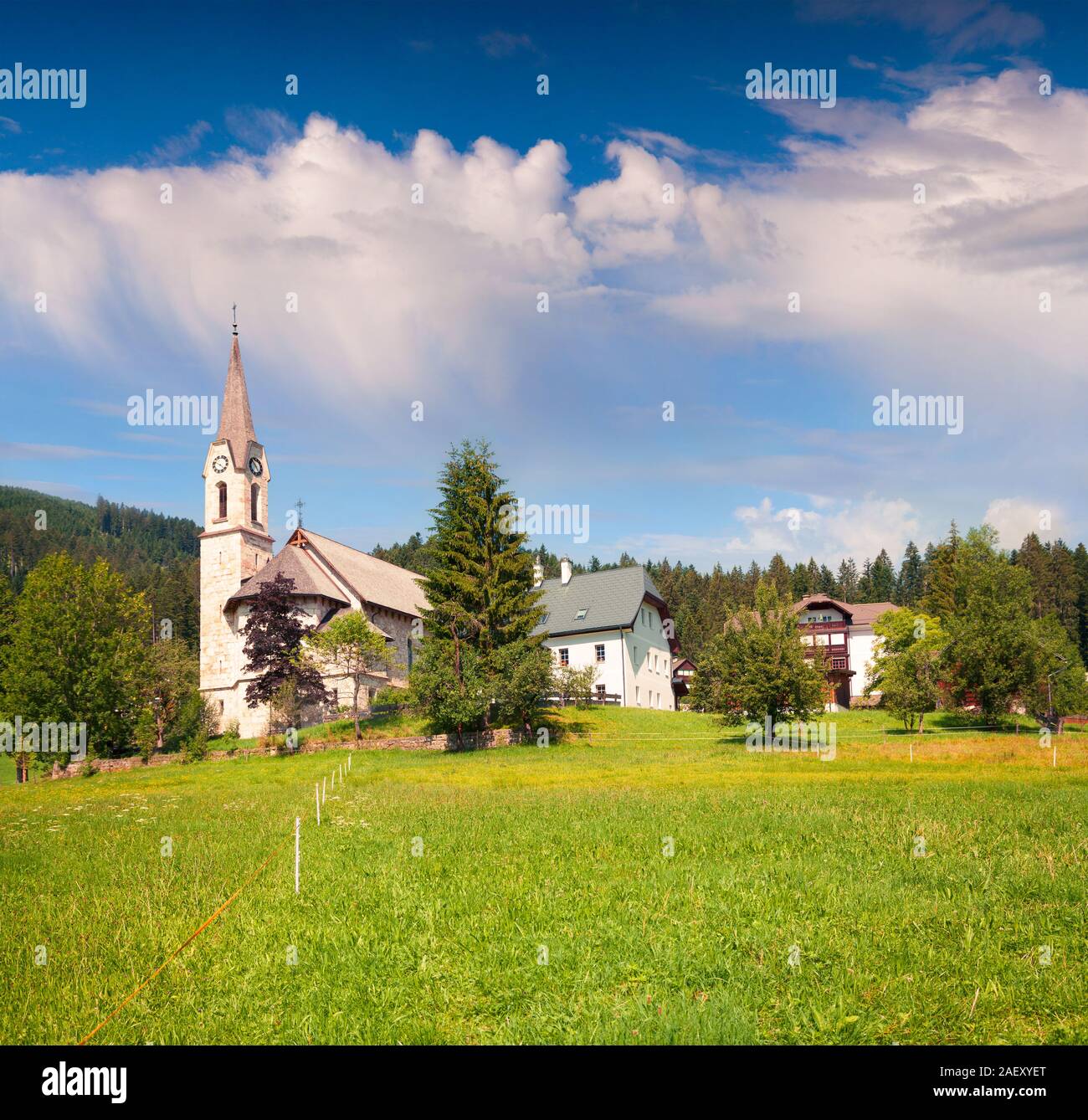 Bright sunny morning in Gosau village with Christianity churh. Colorful outdoor scene in Austrian Alps, Liezen District of Styria, Austria. Europe. Ar Stock Photo