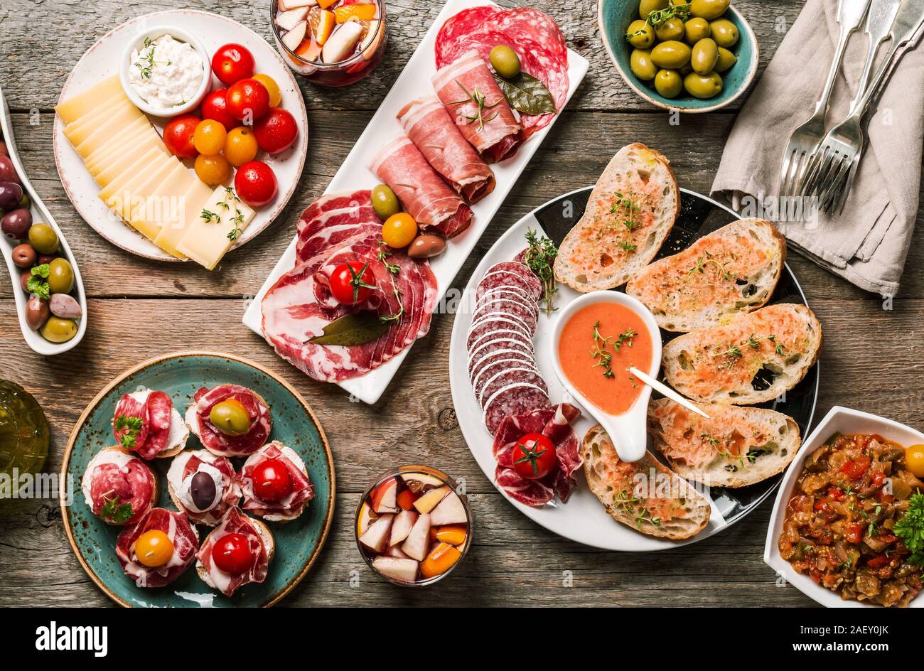 spanish tapas and sangria on wooden table, top view Stock Photo - Alamy