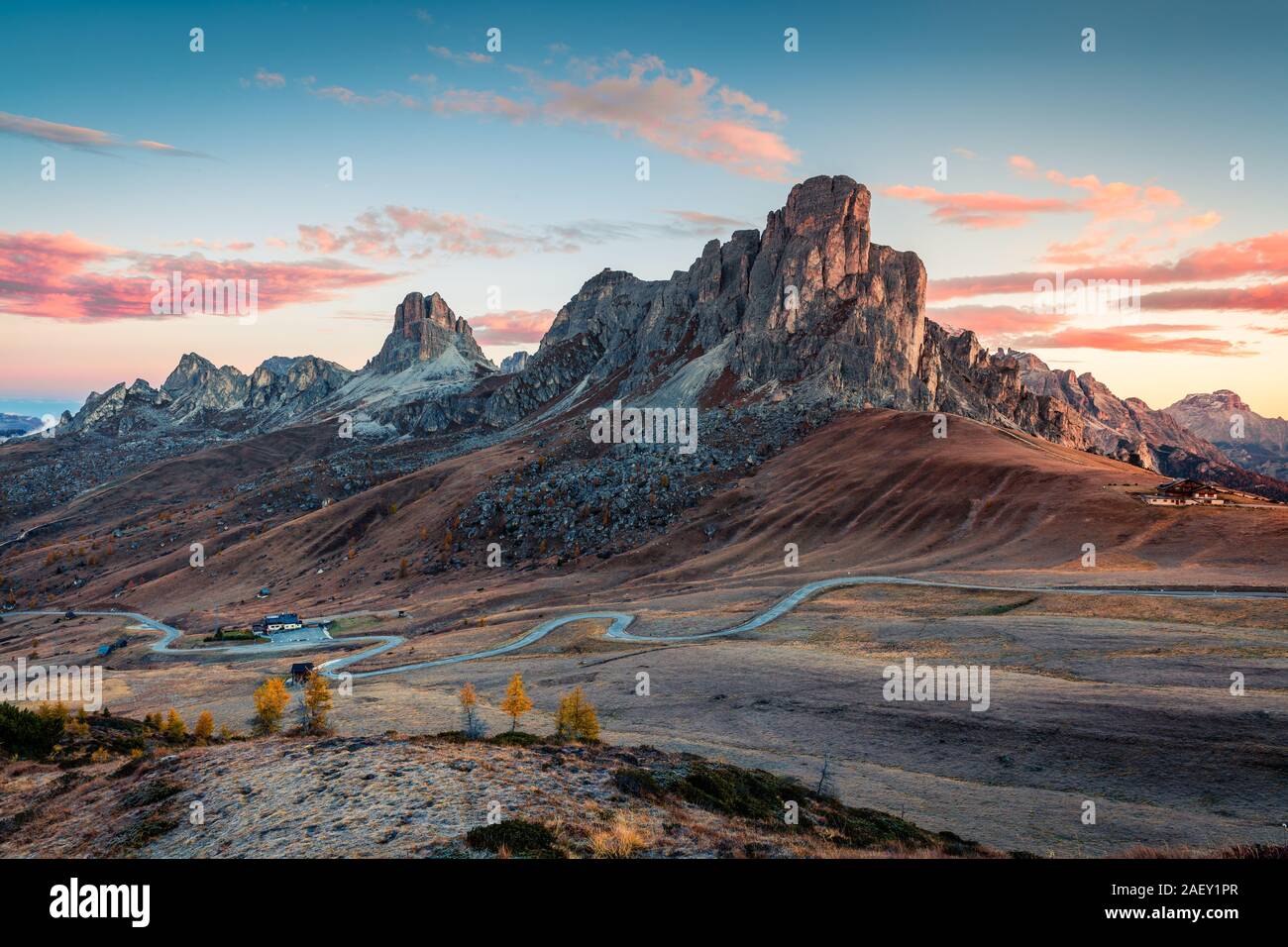 Fantastic morning view from the top of Giau pass with famous Ra Gusela, Nuvolau peaks in background. Colorful autumn sunrise in Dolomite Alps, Italy. Stock Photo