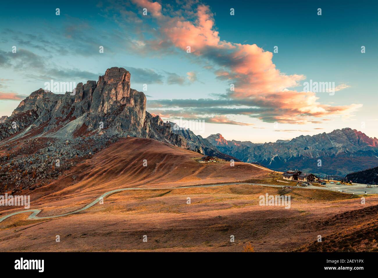 Fantastic morning view from the top of Giau pass with famous Ra Gusela, Nuvolau peaks in background. Colorful autumn sunrise in Dolomite Alps, Italy. Stock Photo