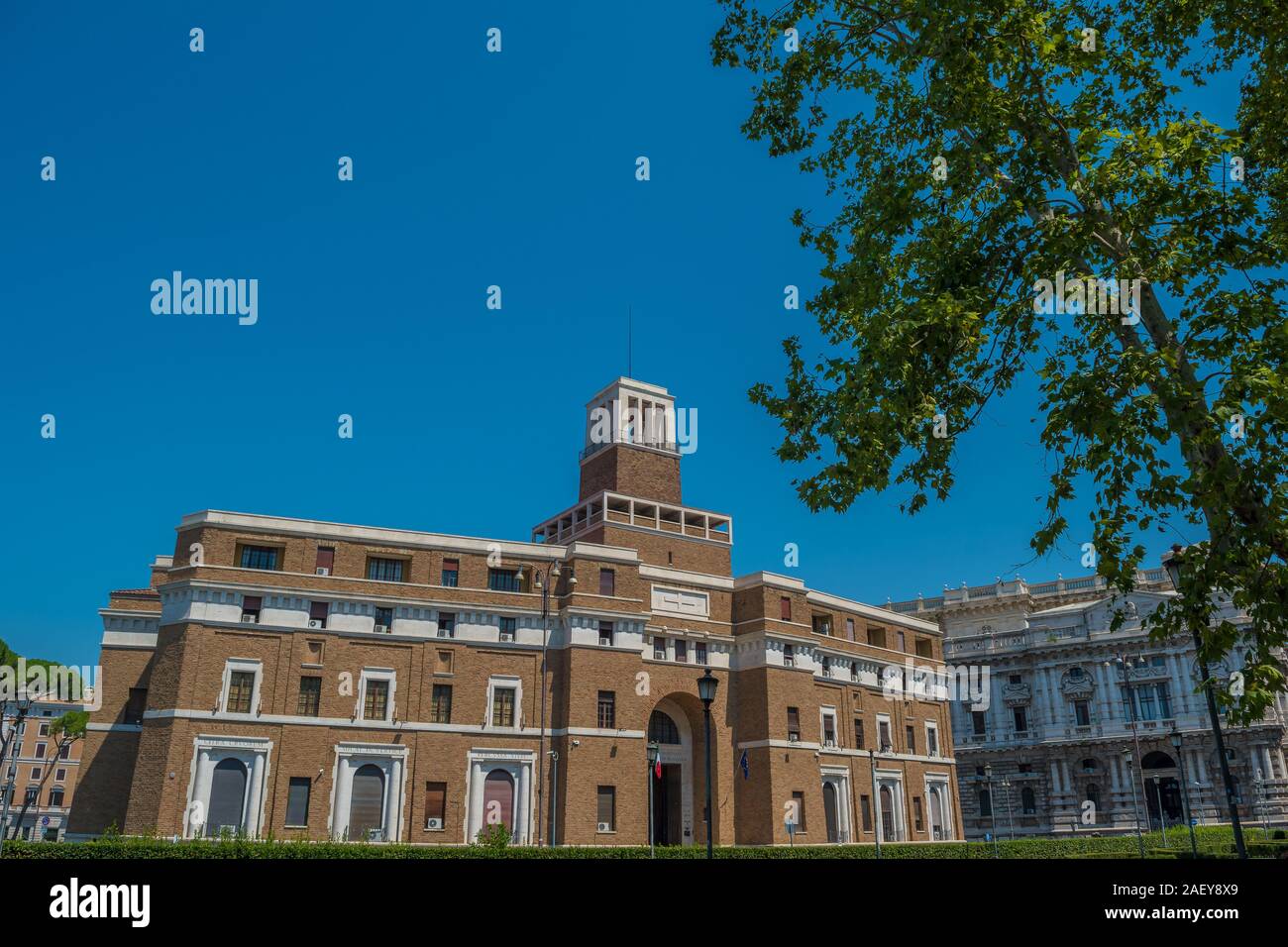 Beautiful tree-lined square in front of the court, great for buying souvenirs Stock Photo