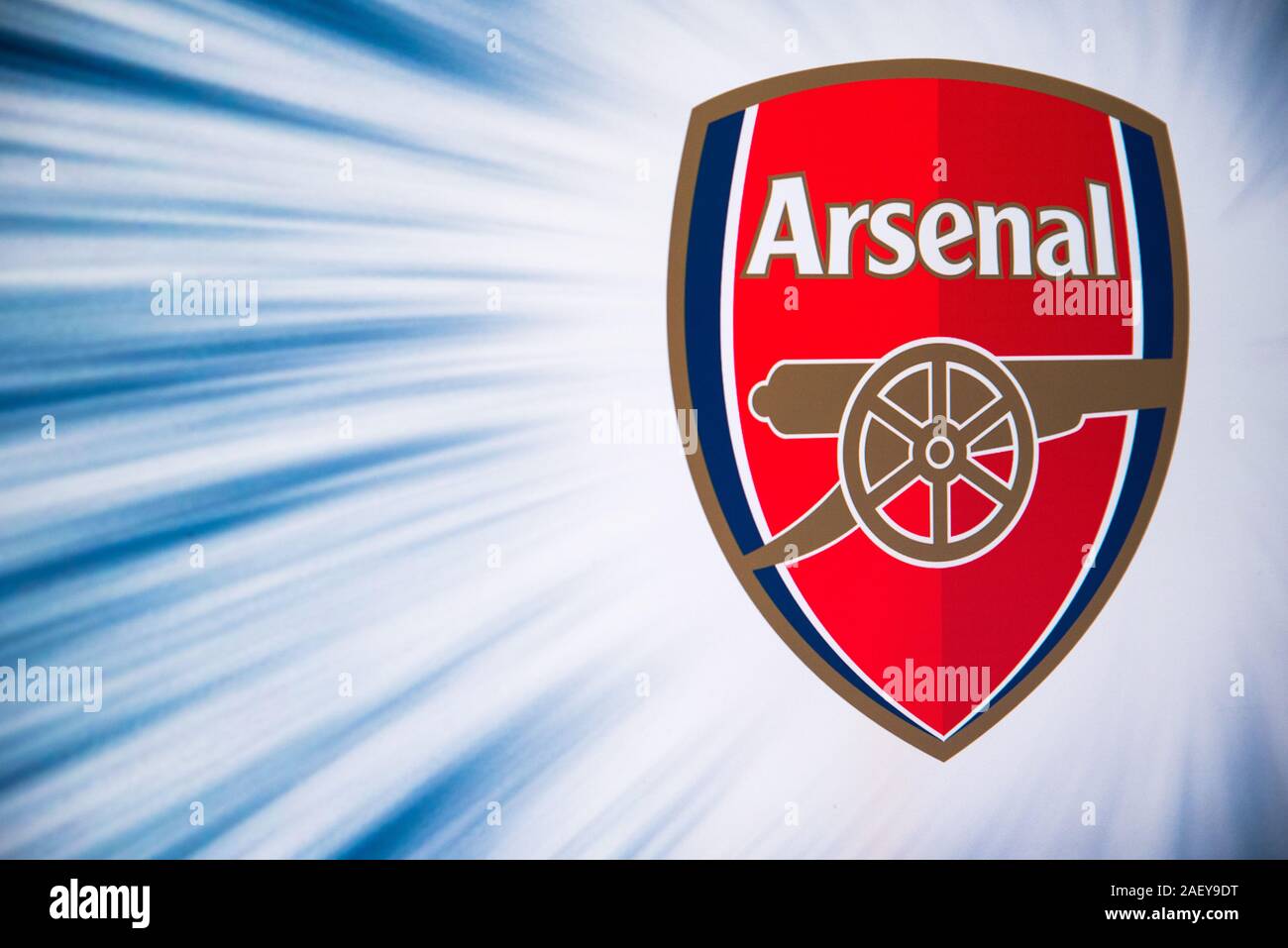 LONDON, ENGLAND, JULY. 1. 2019: Arsenal Football club logo, Premier League, England. Soccer player silhouette. Stock Photo