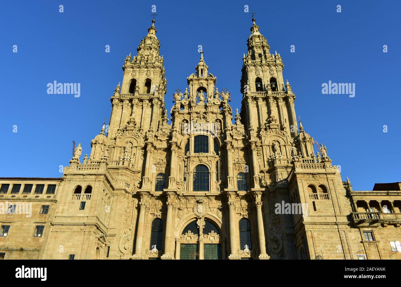 Cathedral with sunset light and blue sky. View from Praza do Obradoiro. Santiago de Compostela, Spain. Stock Photo