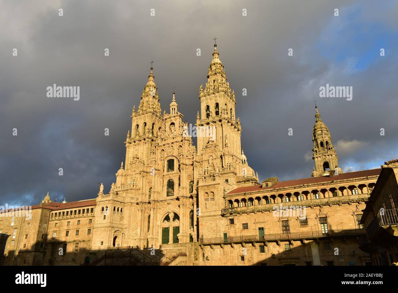 Cathedral with sunset light on a rainy day. View from Praza do Obradoiro. Santiago de Compostela, Spain. Stock Photo