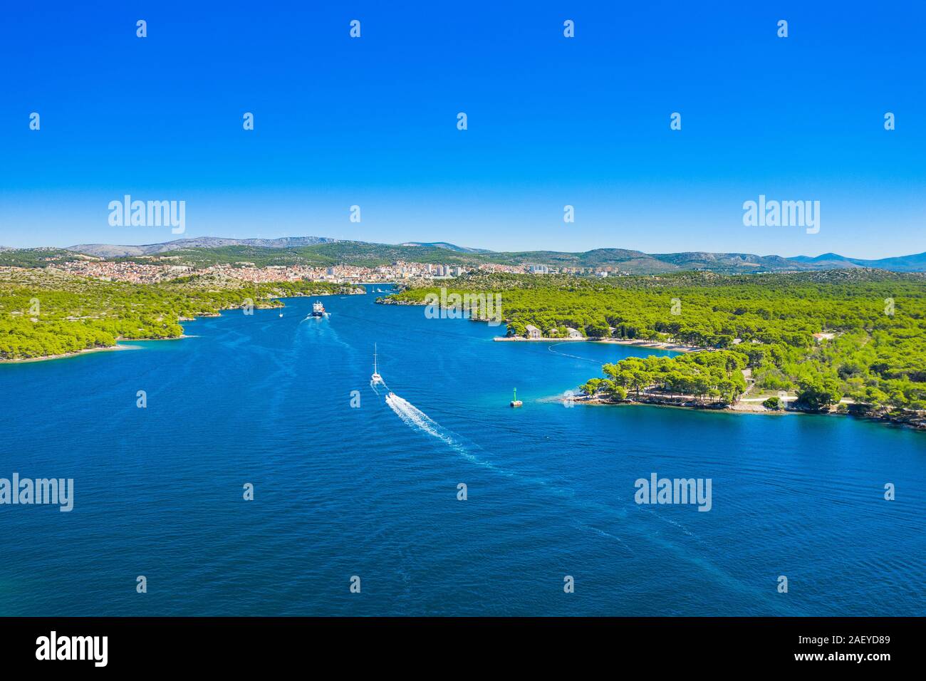 Croatia, Adriatic sea, big freighter ship entering Sibenik channel, in Dalmatia, Croatia, drone aerial shot, beautiful seascape Stock Photo