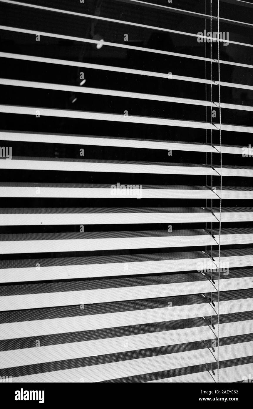 Abstract view on window with louvers Stock Photo