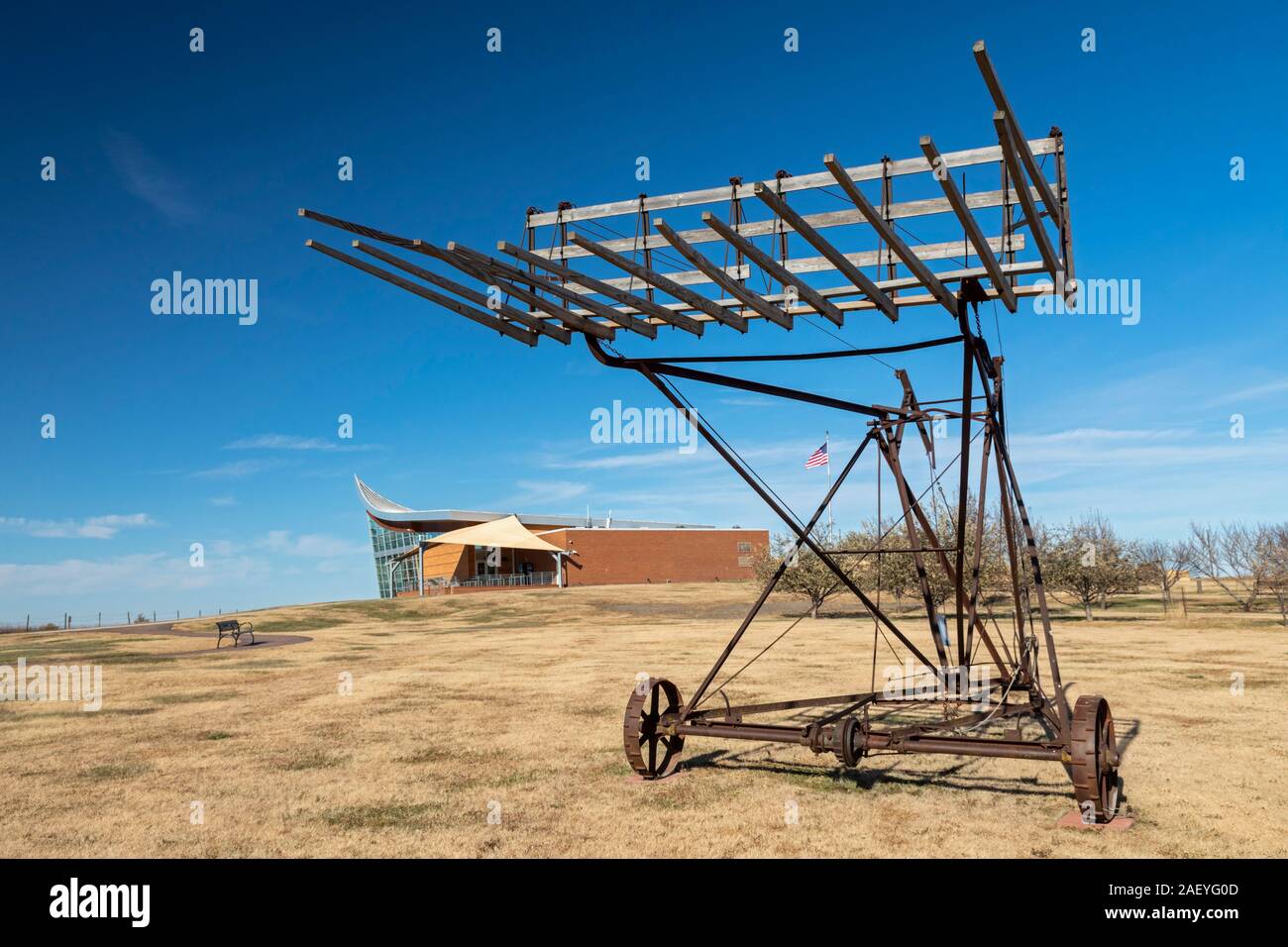 Beatrice, Nebraska - Homestead National Monument. A piece of old farm machinery is displayed outside the Heritage Center. Stock Photo