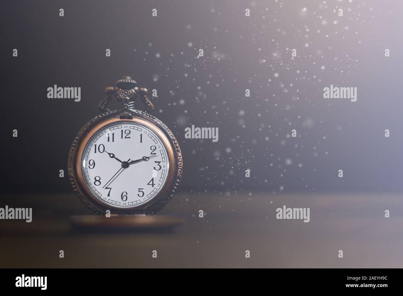 Old pocket watch on dark background Stock Photo