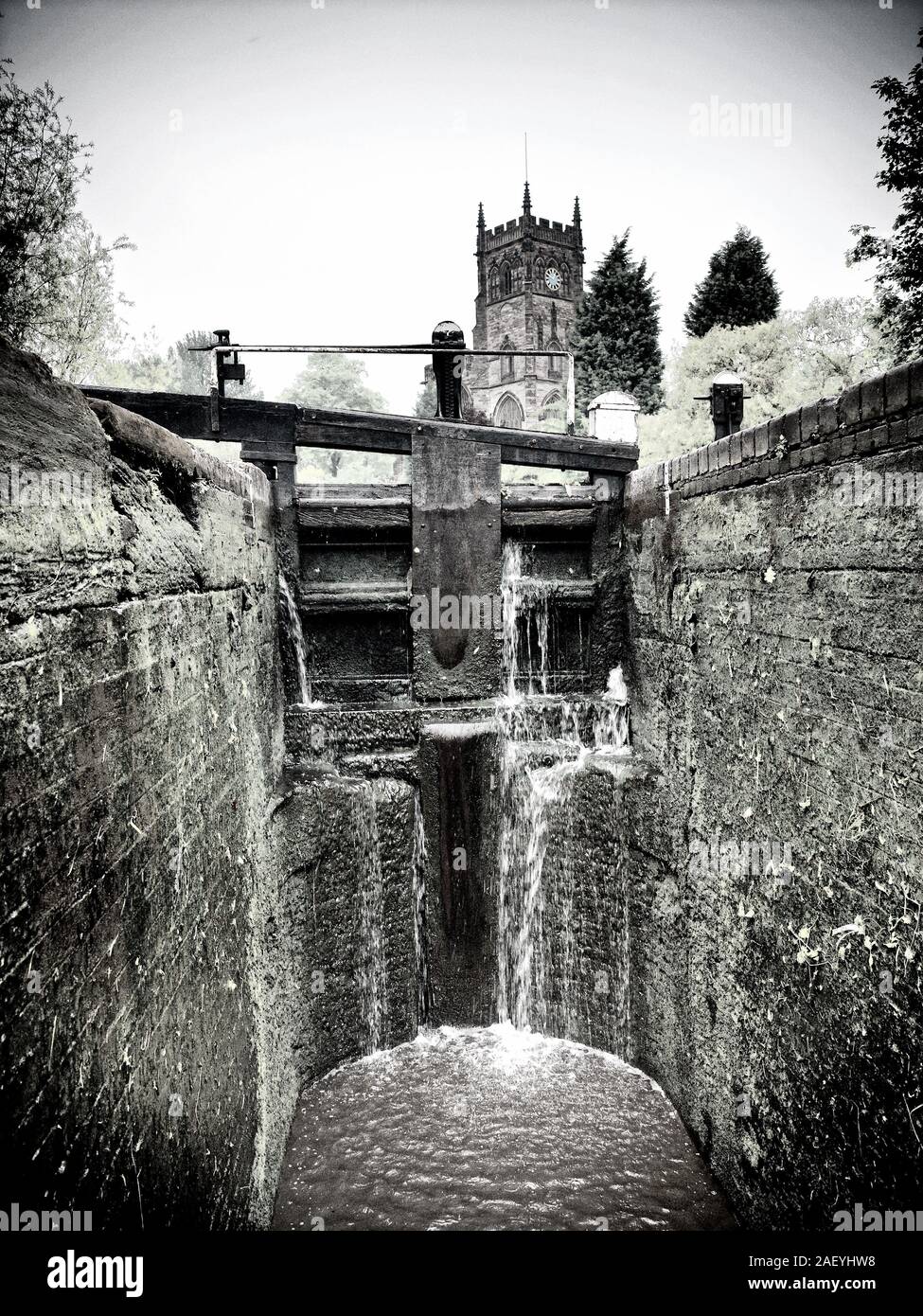 Interior of a narrow Lock with St Mary's Church at Kidderminster, UK Stock Photo