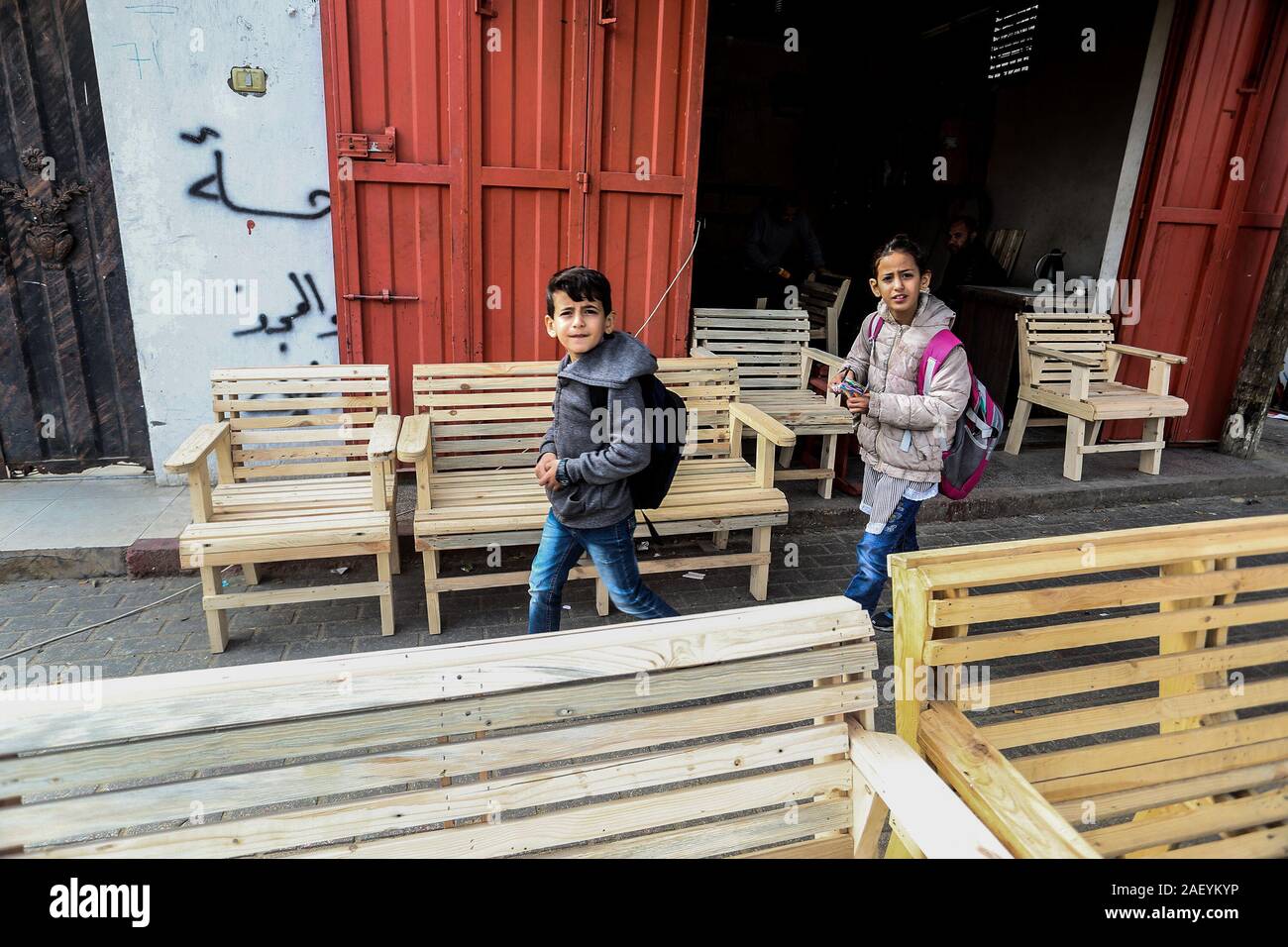 Palestinian man makes chairs from used wood, due to their inability to purchase new wood because of the deteriorating economic, in Gaza Strip. Stock Photo