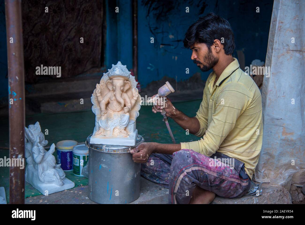 AMRAVATI, MAHARASHTRA AUGUST 25, 2018 Artist making a statue and