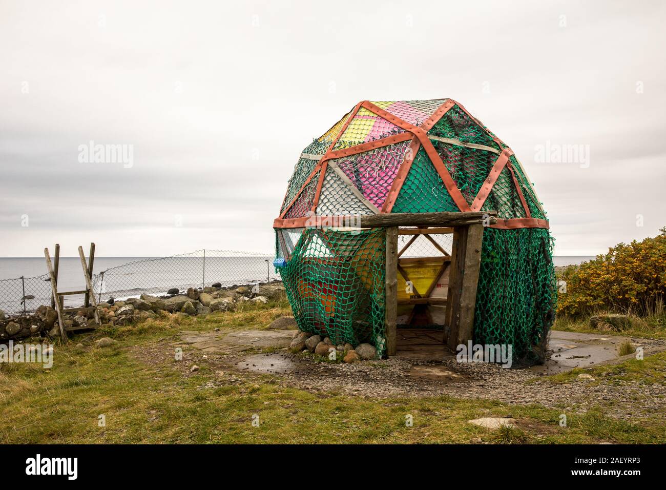 Borhaug, Norway - October 2019: Cabin by the ocean made by plastic from the ocean. Stock Photo