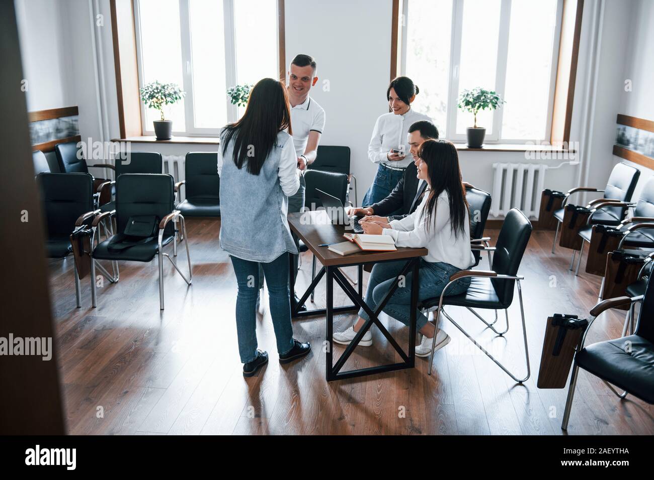 Spacious room. Business people and manager working on their new project Stock Photo