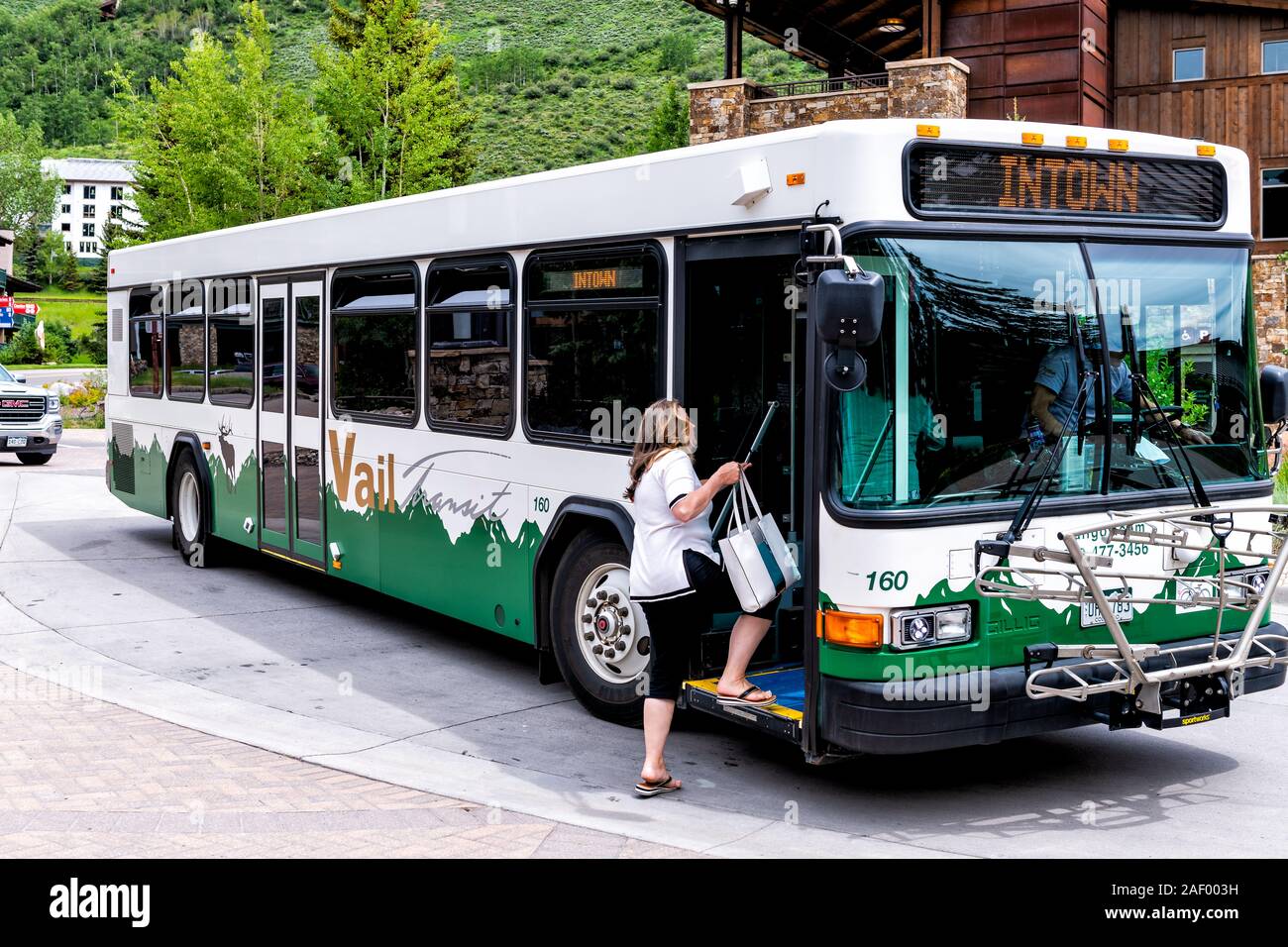 Vail, USA - June 29, 2019: People boarding bus on Lionshead circle street road in Colorado ski resort town summer Stock Photo