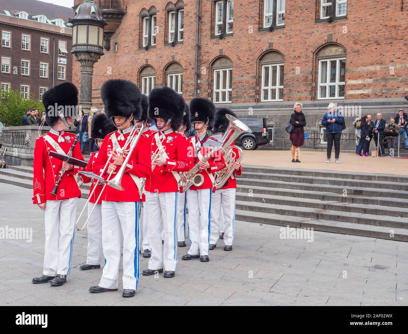 Copenhagen, Denmark - May 28, 2019: The Tivoli Gardens Youth Guard band in red gala uniform next to City Hall   in Kopenhagen, Denmark, Drums and Fife Stock Photo