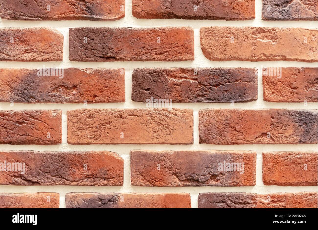 Brick Wall Of Red And Brown Bricks Background And Texture Of Brickwork Stock Photo Alamy