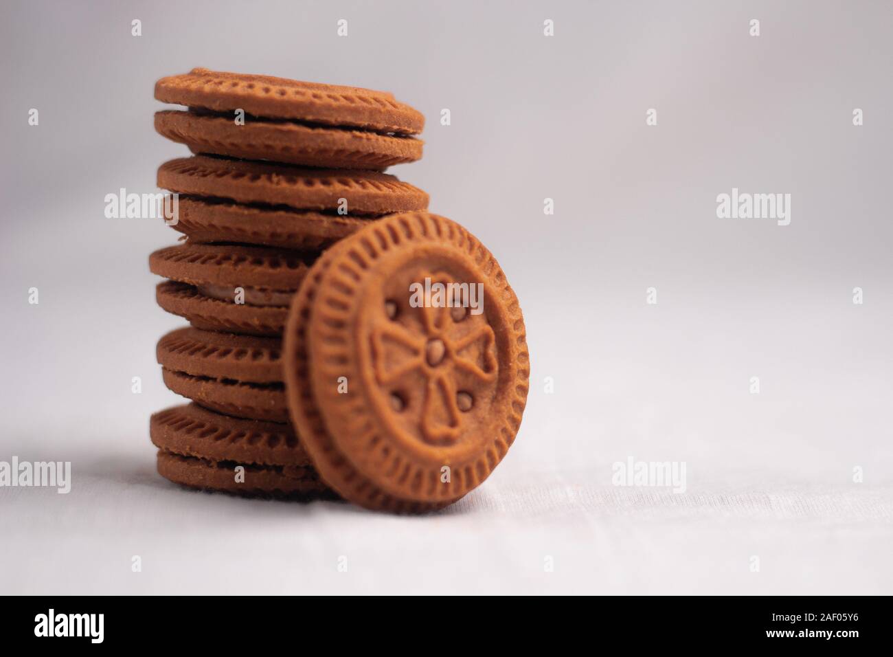 pile of brown cream biscuits Stock Photo - Alamy