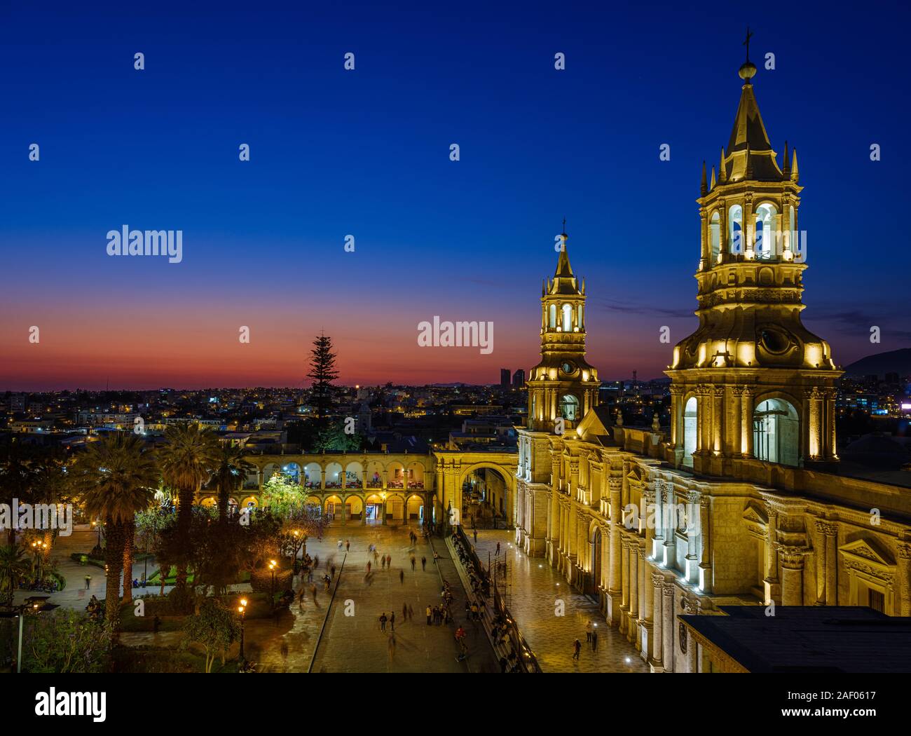 AREQUIPA, PERU - CIRCA SEPTEMBER 2019:  The Basilica Cathedral of Arequipa and Plaza de Armas at dusk. It is the most important Catholic church of the Stock Photo