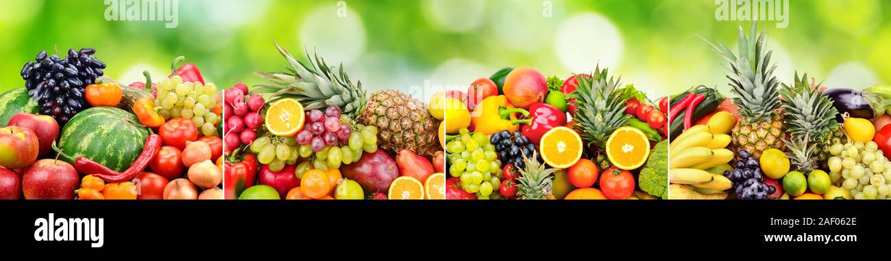 Panoramic skinali from bright fresh vegetables, fruits, berries on green natural blurred background. Stock Photo